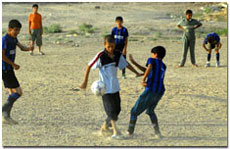 Boys playing football