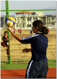 girl playing volleyball